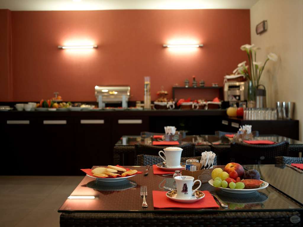 פסקיארה בורומאו Hotel Montini Linate Airport מסעדה תמונה